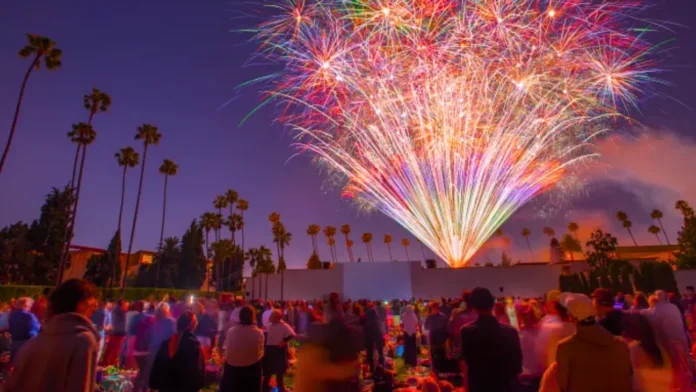 Hollywood Forever Cemetery is lit by fireworks as thousands gather for an outdoor Cinespia screening.
