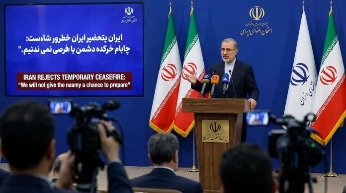 তেহরানে সংবাদ সম্মেলনে বক্তব্য দিচ্ছেন ইরানের পররাষ্ট্র মন্ত্রণালয়ের মুখপাত্র ইসমাইল বাঘাই।